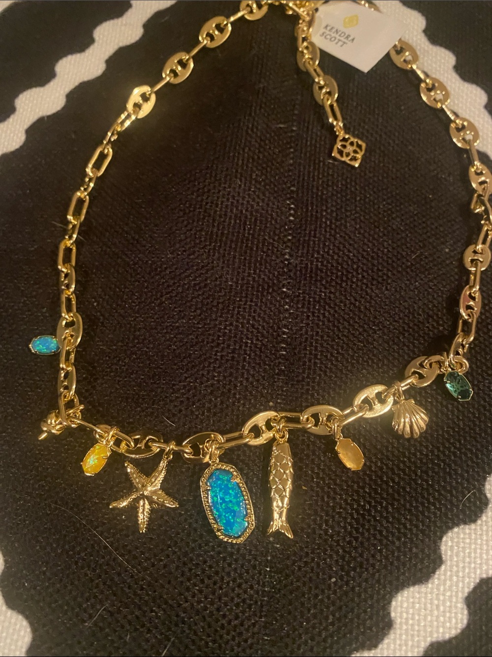 Kendra Scott Gold-tone Ocean Charm Necklace with Blue and Yellow Opal Accents